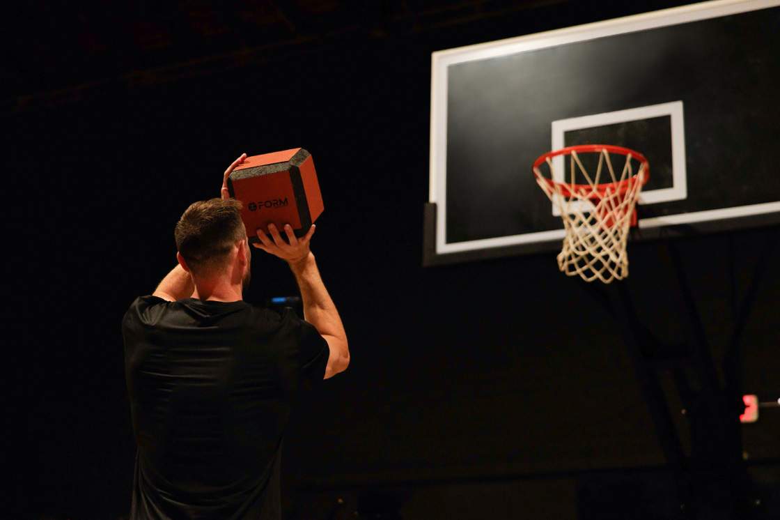 man training on basketball court